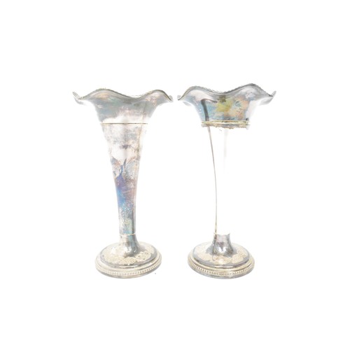 145 - Silver plated group consisting cocktail shakers, candlesticks, tea and fish knives, some new and box... 