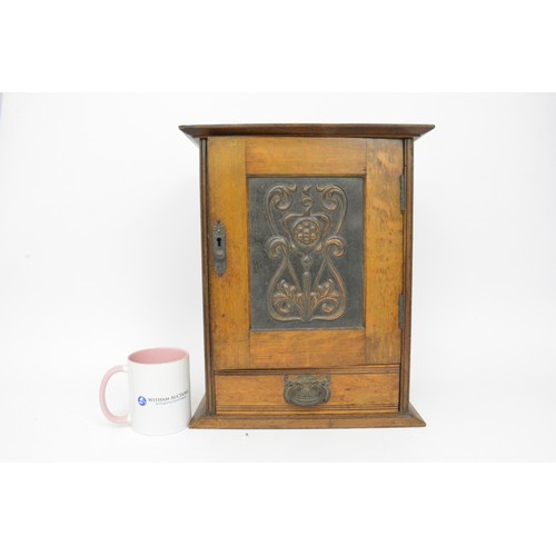 146 - Smoker's cabinet, front door panel with art nouveau decoration, top hinged lid and bottom drawer