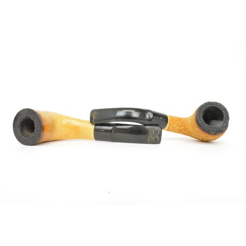 151 - Three  Meerschaum pipes, one in fitted case