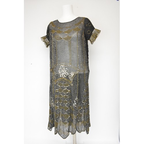 !920's Flapper Dress, sequins and tulle. black with gold and silver patterned diamantes and sequins all over, scoop neck