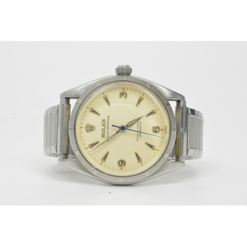 367 - Rolex Oyster Perpetual, 6565, serial no and model no both present. Replacement strap