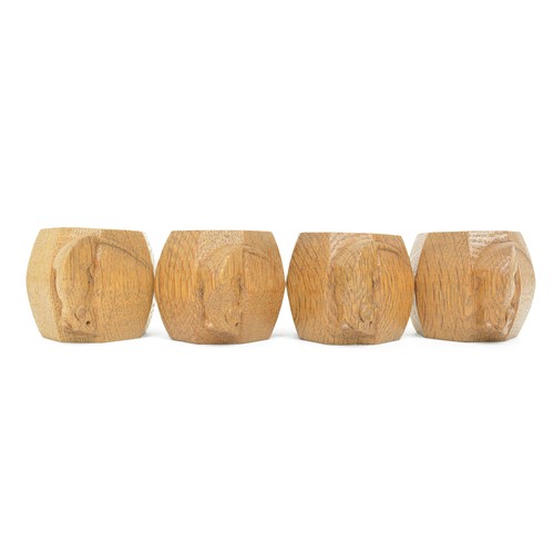 19 - A set of four Robert 'Mouseman' Thompson octagonal napkin rings