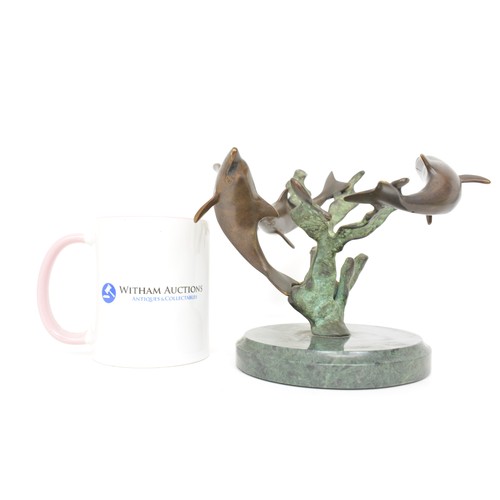 23 - Sculpture of three bronze dolphins on marble base made by SPI Sand Pacific International