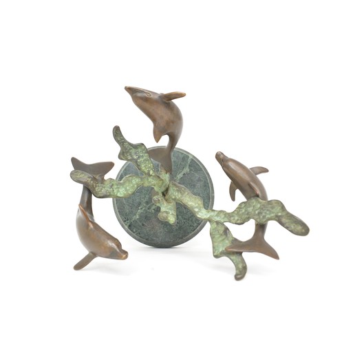 23 - Sculpture of three bronze dolphins on marble base made by SPI Sand Pacific International
