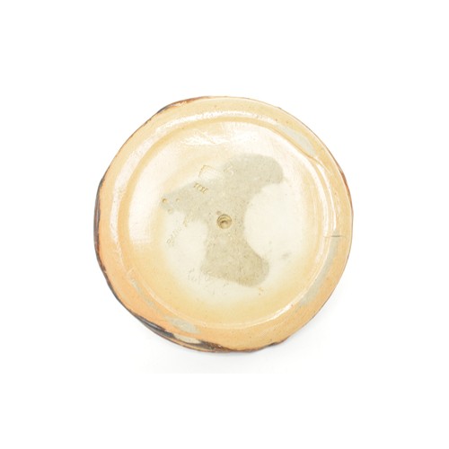 33 - A Doulton Lambeth stoneware match stand, Lifebuoy, circa 1894, modelled as a mans head and ring, mar... 