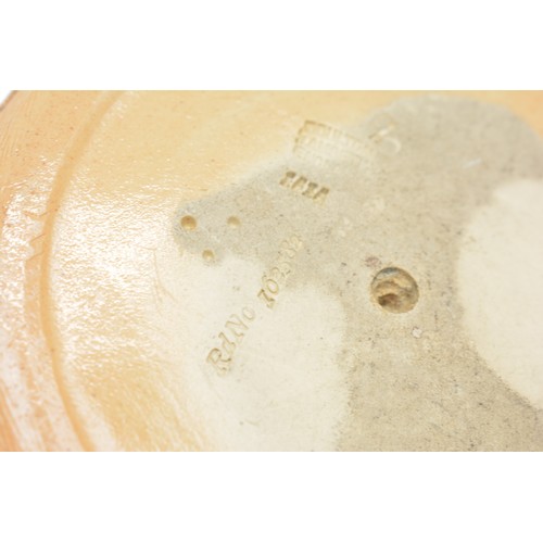 33 - A Doulton Lambeth stoneware match stand, Lifebuoy, circa 1894, modelled as a mans head and ring, mar... 