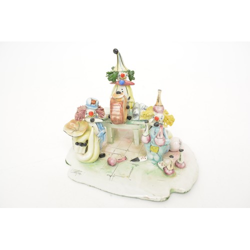 38 - A collection of Italian Zampiva ceramic clown figures, rare model of three piece band, signed to bas... 