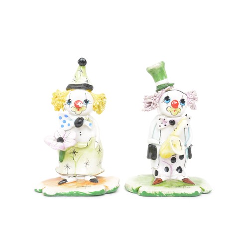 38 - A collection of Italian Zampiva ceramic clown figures, rare model of three piece band, signed to bas... 
