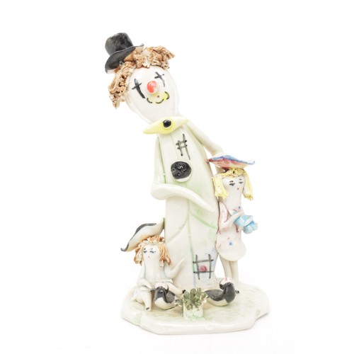 38 - A collection of Italian Zampiva ceramic clown figures, rare model of three piece band, signed to bas... 