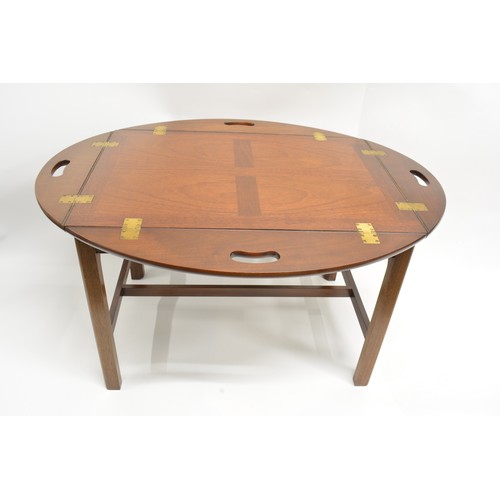 55 - Mahogany butlers tray with folding  brass hinges, on removable stand