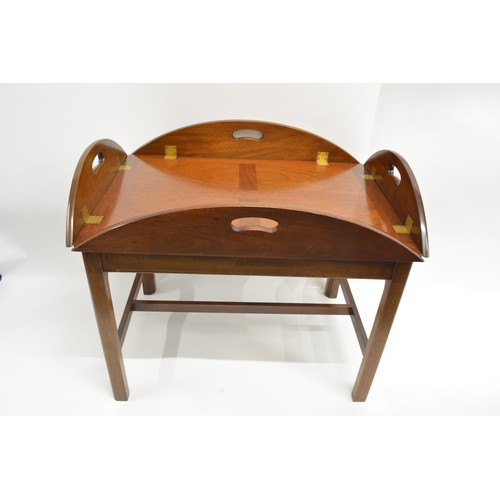 55 - Mahogany butlers tray with folding  brass hinges, on removable stand