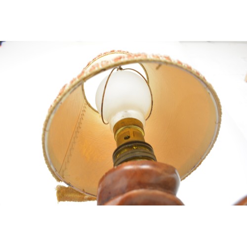 59 - A pair of oriental lamps, carved form of elder holding staff. Untested AF.