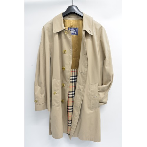 95 - Burberrys Mac with check lining, 48