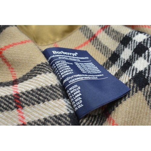 95 - Burberrys Mac with check lining, 48