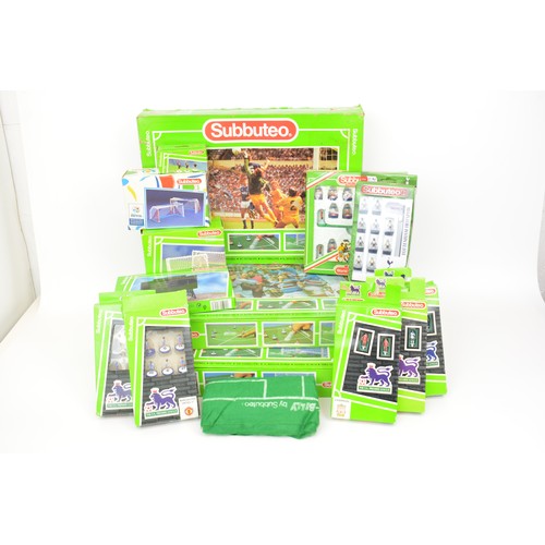 104 - Boxed Subbuteo sets together with x6 Premier League teams, a Scotland World Cup, score board, goals,... 