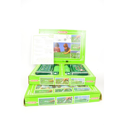 104 - Boxed Subbuteo sets together with x6 Premier League teams, a Scotland World Cup, score board, goals,... 