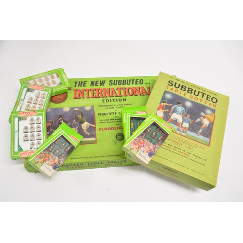 105 - The New Subbuteo table soccer International Edition large set together with one other Subbuteo table... 