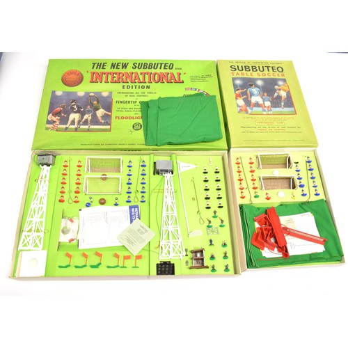 105 - The New Subbuteo table soccer International Edition large set together with one other Subbuteo table... 