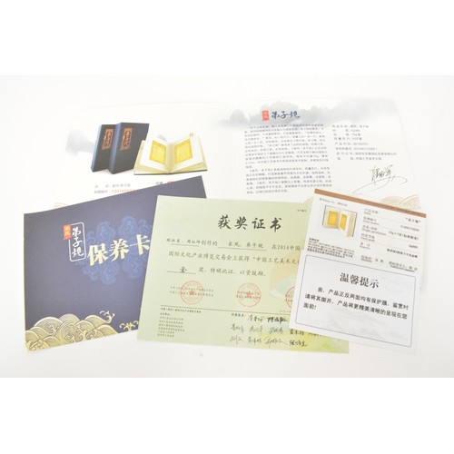 114 - Chinese family tradition presentation book, limited edition set of Ag 990 silver cards. Gold award w... 
