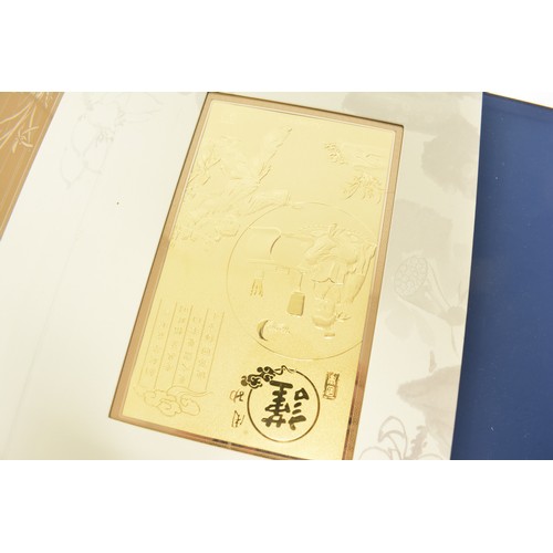 114 - Chinese family tradition presentation book, limited edition set of Ag 990 silver cards. Gold award w... 