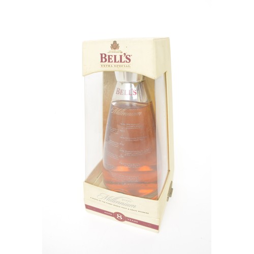 117 - A large collection of Wade ceramic Scotch Whisky decanters - Bells and Famous Grouse.  Plus Whyte an... 