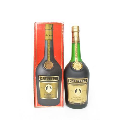 149 - One boxed bt MARTELL Medaillon Liqueur VSOP Cognac,24 fl ozs,70 Proof 1970s.