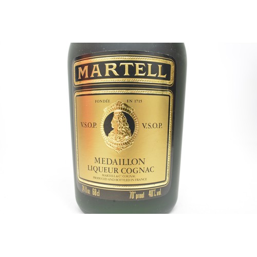 149 - One boxed bt MARTELL Medaillon Liqueur VSOP Cognac,24 fl ozs,70 Proof 1970s.