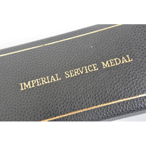 184 - A British military George VI Imperial Service medal awarded to Herbert Robert Wright Taylor together... 