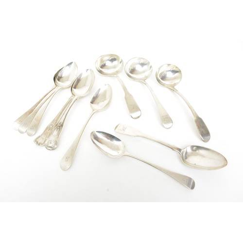 224 - Collection of Georgian silver dessert spoons and ladles, approx gross weight 462g.