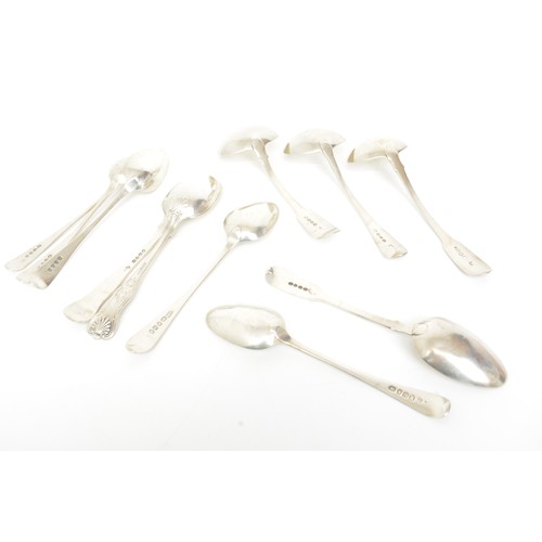 224 - Collection of Georgian silver dessert spoons and ladles, approx gross weight 462g.