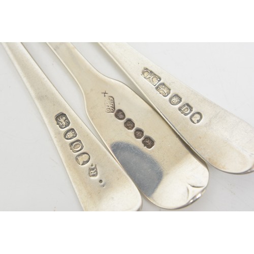 224 - Collection of Georgian silver dessert spoons and ladles, approx gross weight 462g.