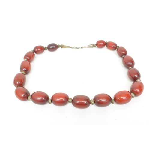 232 - Vintage heavy set beaded necklace. Possibly middle eastern mixed composite resin Faturan, Approx wei... 