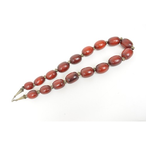 232 - Vintage heavy set beaded necklace. Possibly middle eastern mixed composite resin Faturan, Approx wei... 