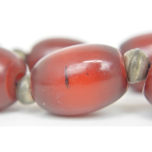 232 - Vintage heavy set beaded necklace. Possibly middle eastern mixed composite resin Faturan, Approx wei... 