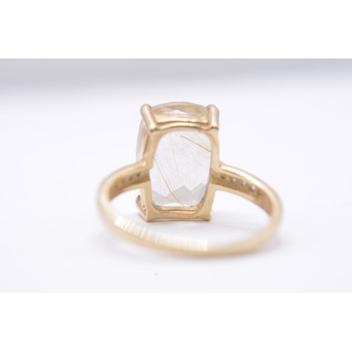 258 - 9ct yellow gold ring with golden rutilated quartz and diamonds, marked 375, approx size P