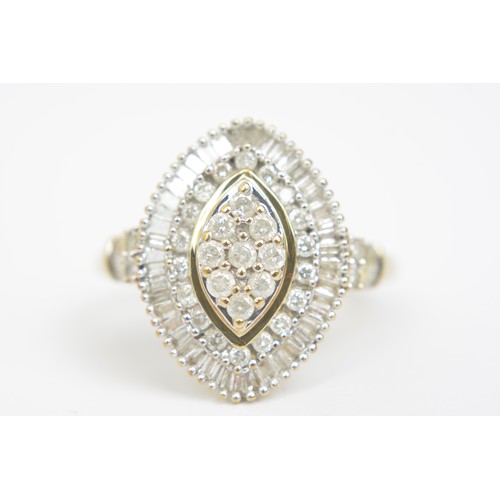 261 - Yellow gold Baguette and round cut diamond ring in marquise design with accent diamonds to shoulder,... 