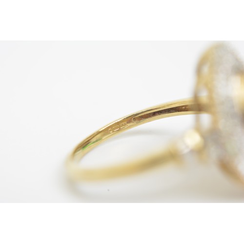 261 - Yellow gold Baguette and round cut diamond ring in marquise design with accent diamonds to shoulder,... 