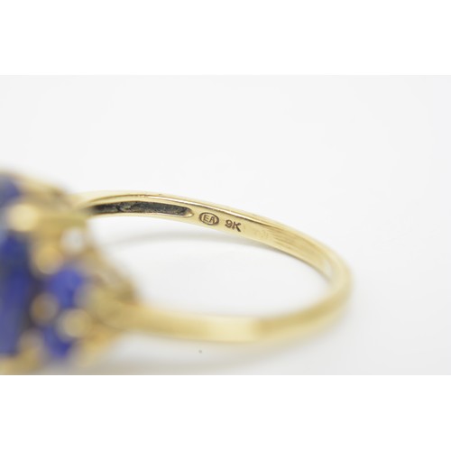 270 - Lapis Lazuli 9ct yellow gold ring, cabochon oval central stone with four round stones, approx size P... 