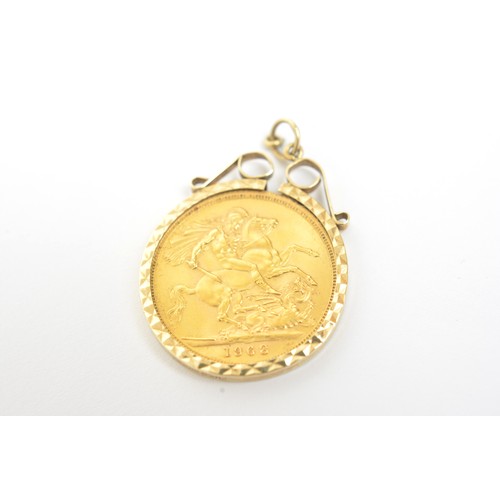 A Queen Elizabeth II 1963 full gold sovereign in 9ct gold mount. Total ...