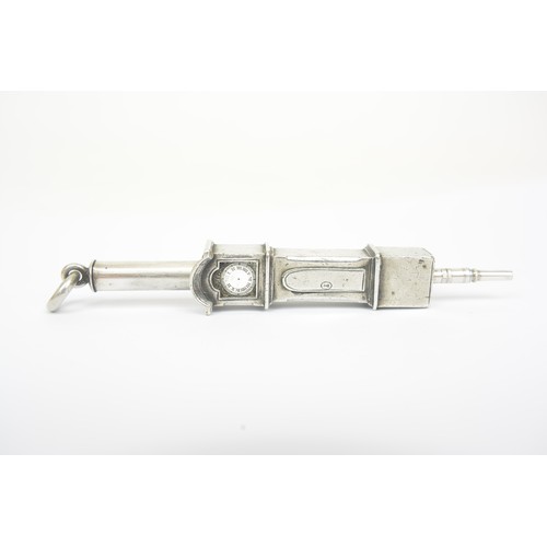 A Victorian sterling silver novelty propelling pencil, circa 1880 by Sampson Mordan. Modelled as a longcase clock, with white enamelled dial with Roman hour numerals. Ring attachment. Stamped Sampson Mordan and Co to internal section.