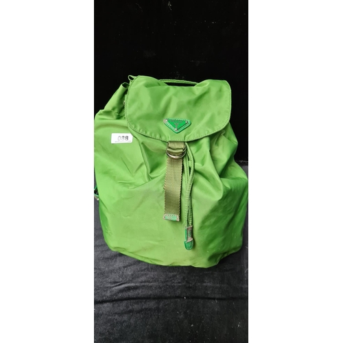 88 - Green Prada back pack. Believed to be Genuine but should be viewed.