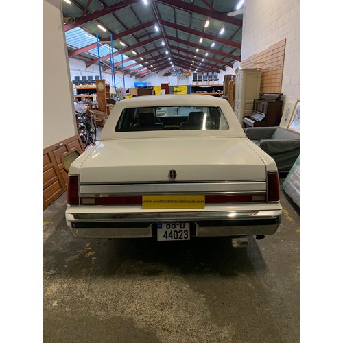 13 - LINCOLN TOWNCAR 1988, 5 LITRE MONSTER, 11,560  miles (unsupported). White with beige leather interio... 