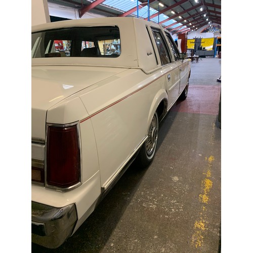 13 - LINCOLN TOWNCAR 1988, 5 LITRE MONSTER, 11,560  miles (unsupported). White with beige leather interio... 