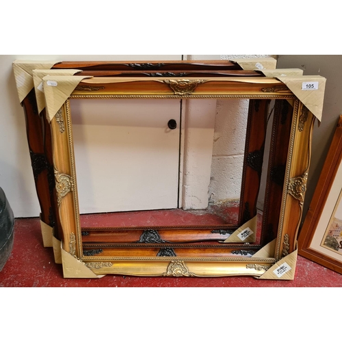 105 - 3 wooden frames inc a gilt example.