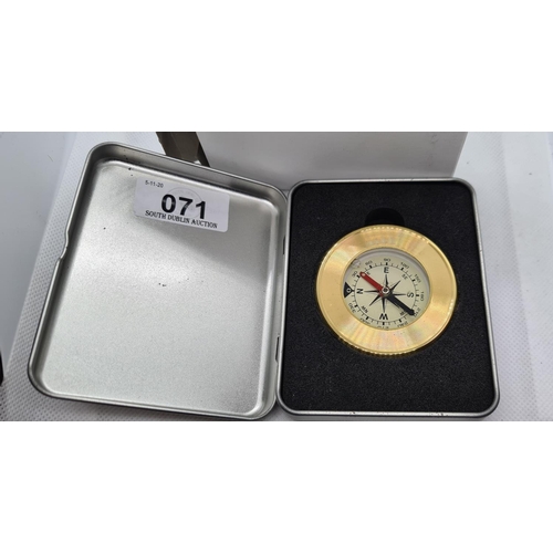 71 - Brass compass in a box.