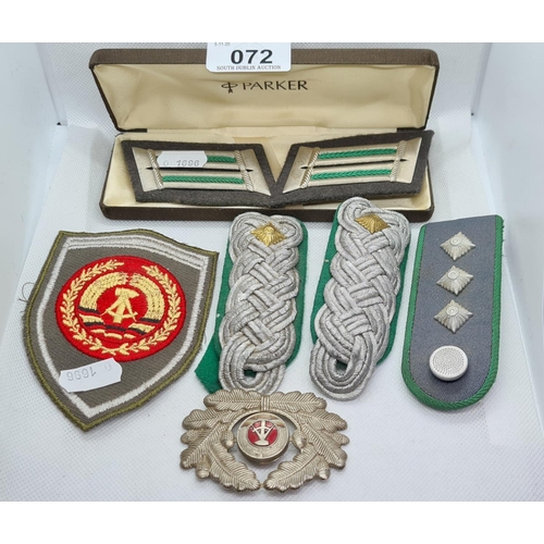 72 - Selection of Military flash and a Soviet large cap badge.