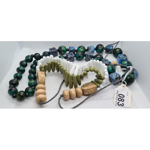 83 - Two wooden African Tribal necklaces.