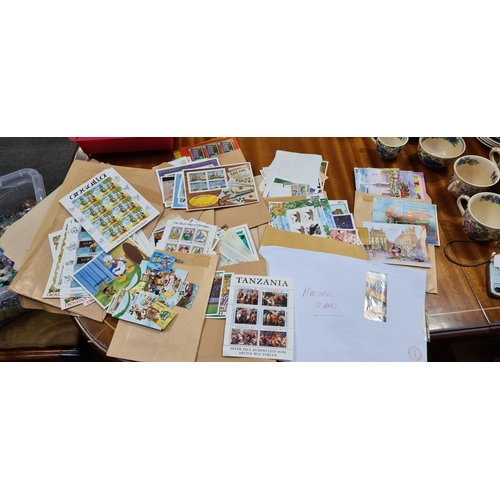 328 - Very large lot of Mint unmounted Stamps in  19 Envelopes 1000s of Stamps.