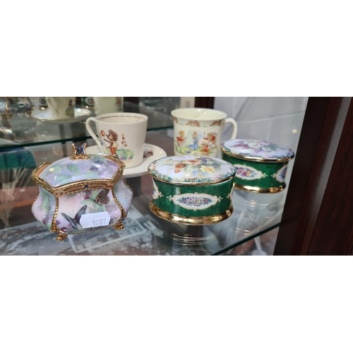 330 - 3 Musical trinket boxes a royal doulton Bunnykins mug and Hedgehogware cup and saucer.