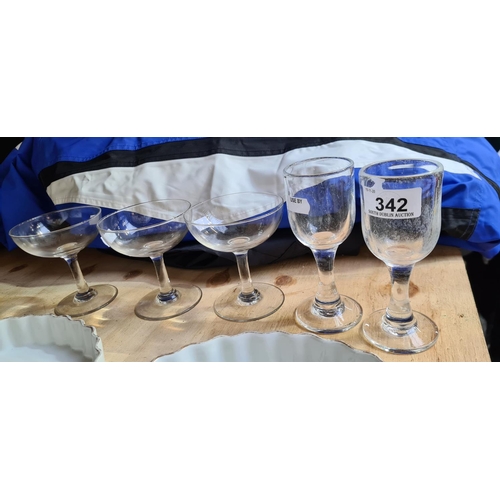 342 - 3 Antique champagne glasses and a matching pair.